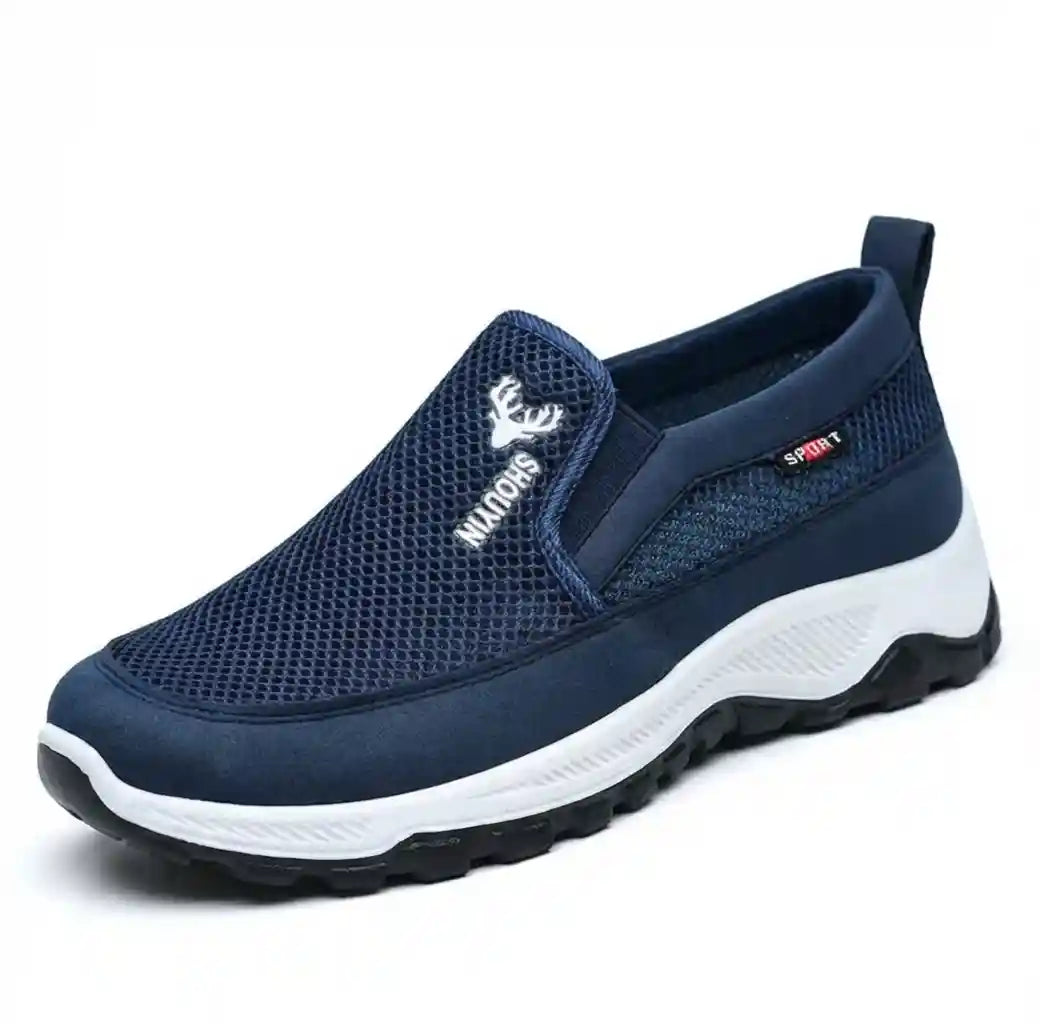 Sneaker orthopédique bleu marine pour homme, vue de profil, mettant en évidence le système d'enfilage rapide sans lacets.