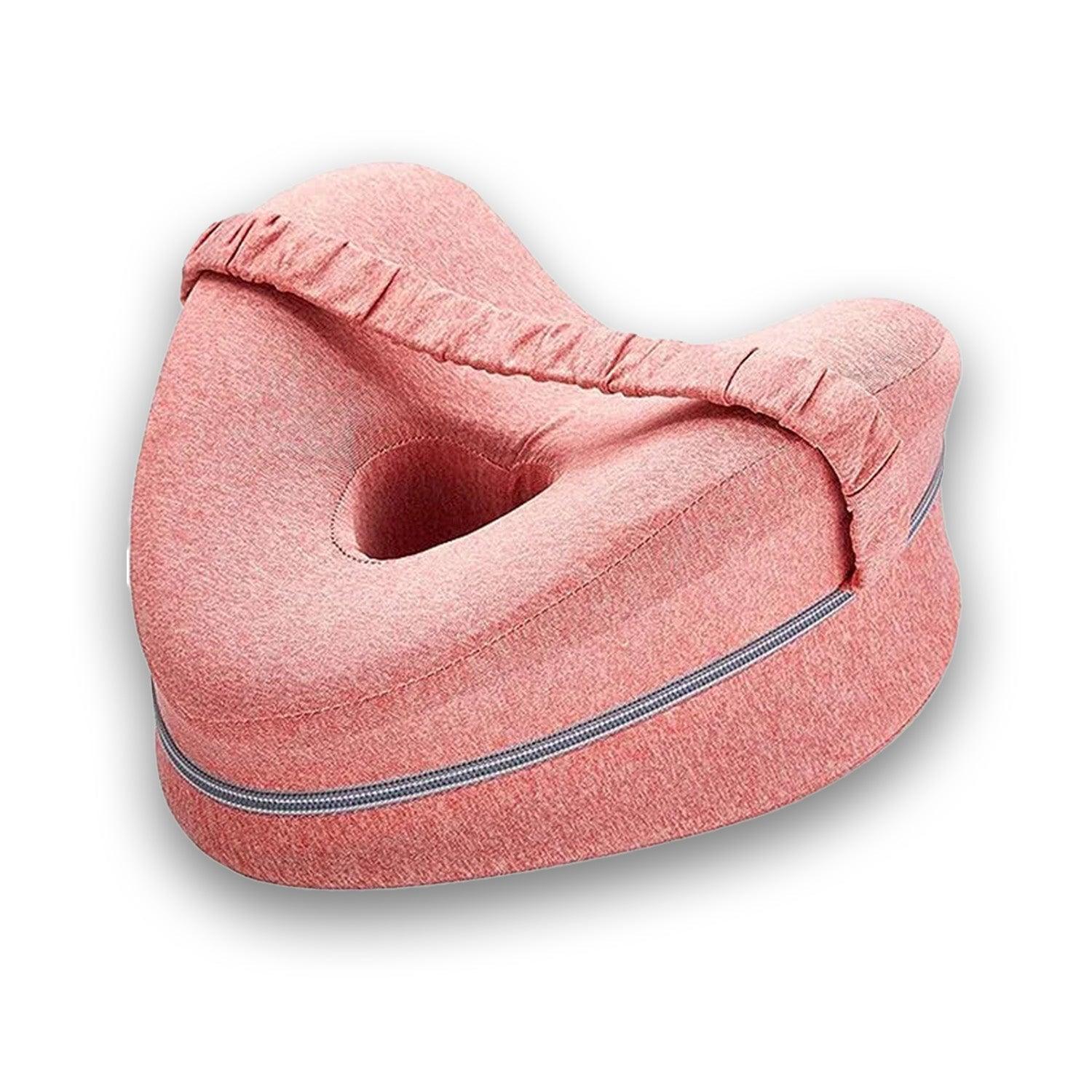Coussin entre genou rose pour espacer les jambes et soulager la pression